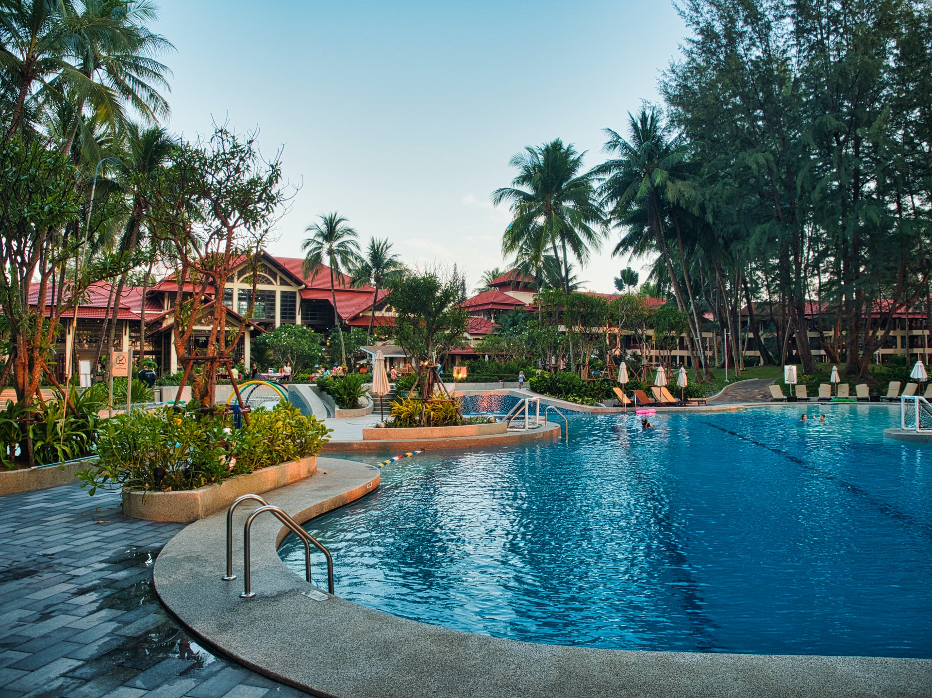 Resort view of pool at sunset